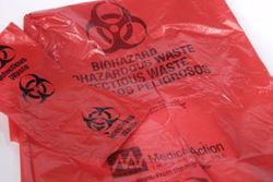 Picture of MEDEGEN LAUNDRY & LINEN BAGS Hamper Bags, 11" X 14¼", 1.25 Mil, Red, "Biohazardous Waste", 20/Rl, 10 Rl/Cs (120 Cs/Plt)