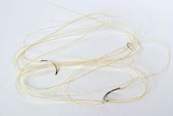 Picture of ETHICON SURGICAL GUT SUTURE - PLAIN Suture, Reverse Cutting, Size 3-0, 18", Needle X-1, ½ Circle, 1 Dz/Bx (Continental US Only)