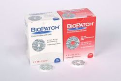 Picture of ETHICON BIOPATCH™ ANTIMICROBIAL DRESSING Disk, 1", 4Mm Center Hole, Sterile, 10/Bx, 4 Bx/Cs (Continental US Only)